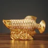 32156dbb74e665cb7ade46a2dfd08cb7.webp Ceramic Golden Arowana Feng Shui Ornament
